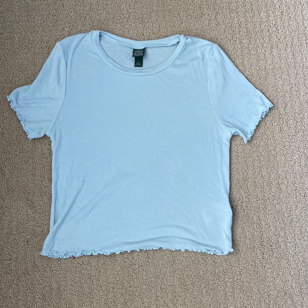 A light blue some sun shirt in size M